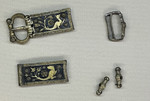 Placchetta 2/2 per fibbia di cintura con figure zoomorfe oro 